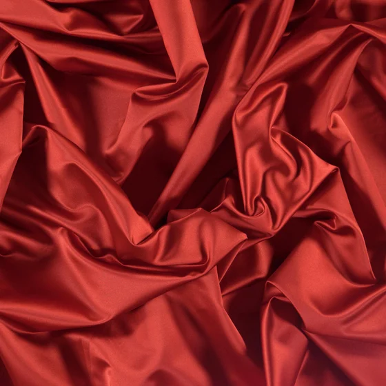 Photo of the fabric Sateen 137 Auburn swatch by Zepel. Use for Curtains, Upholstery, Accessory, Top of Bed. Style of Plain, Taffeta