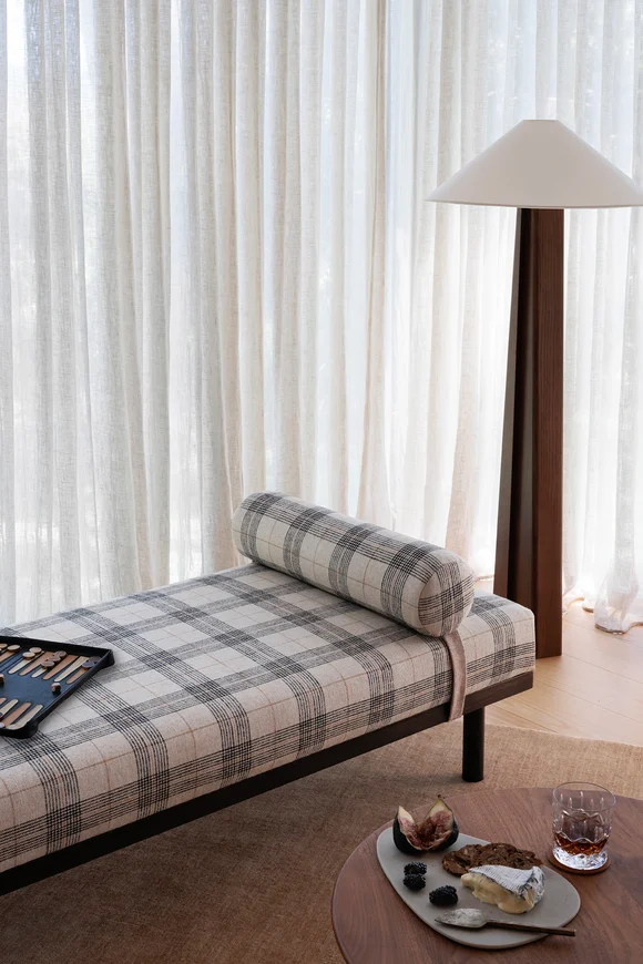 Neutral tartan daybed with backgammon