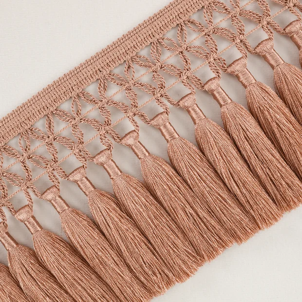 Photo of the fabric Trellis Fringe T118 01 swatch by Romo. Use for Trim