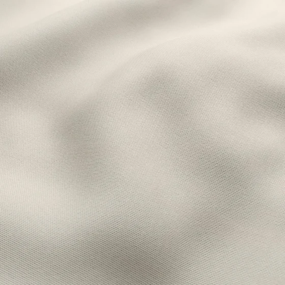Photo of the fabric Sit Out Beige swatch by James Dunlop FibreGuard. Use for Upholstery, Accessory. Style of Plain, Taffeta