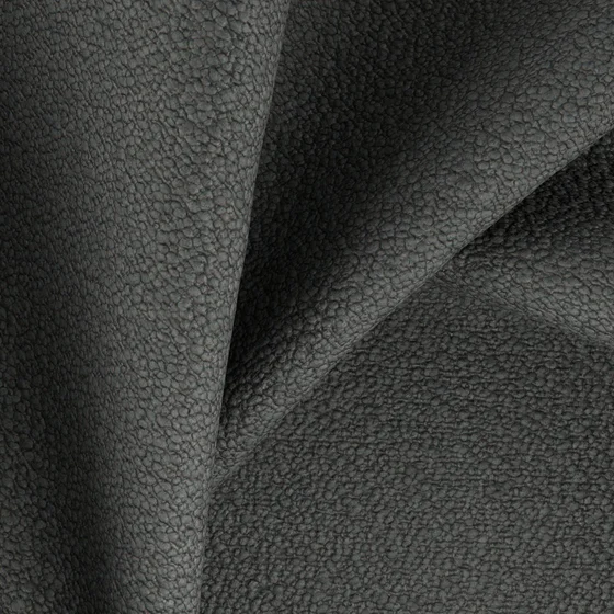 Photo of the fabric Snowdown Charcoal swatch by Zepel FibreGuard. Use for Curtains, Upholstery, Accessory, Top of Bed. Style of Plain, Texture