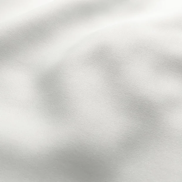 Photo of the fabric Banksia Chalk swatch by James Dunlop. Use for Curtains, Accessory, Top of Bed. Style of Plain, Texture