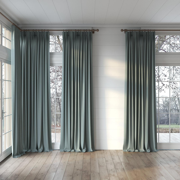 Photo of the fabric Satori Stonewash Teal swatch by Mokum. Use for Curtains, Upholstery Light Duty, Accessory, Top of Bed. Style of Plain, Texture