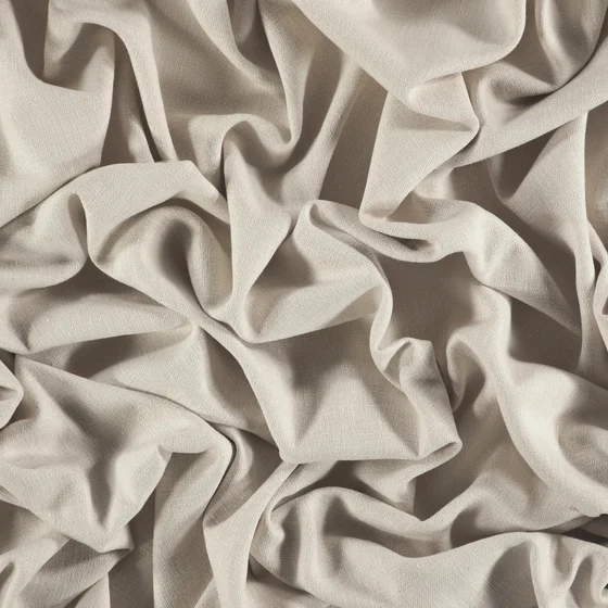 Photo of the fabric Outlander Greige swatch by Zepel. Use for Curtains, Upholstery, Accessory, Top of Bed. Style of Plain, Texture