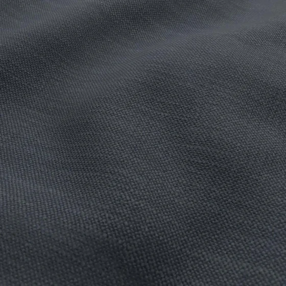 Photo of the fabric Grounded Ink swatch by James Dunlop. Use for Upholstery, Accessory. Style of Plain, Texture
