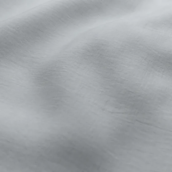 Photo of the fabric Gouache Powder Blue swatch by Mokum. Use for Curtains, Accessory. Style of Plain, Taffeta