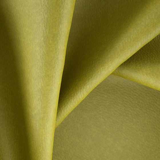 Photo of the fabric Bonanza Olive swatch by Zepel. Use for Upholstery. Style of Leather And Vinyl, Plain
